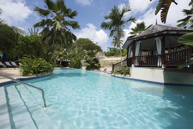 The shared swimming pool and shaded pavilion at Claridges 3